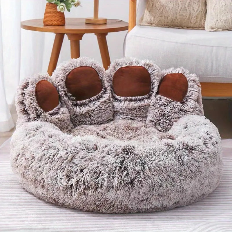 Hundebett in der Größe XXL (90cm Durchmesser) in der Farbe Grau mit Braunen aufstehenden Pfoten.